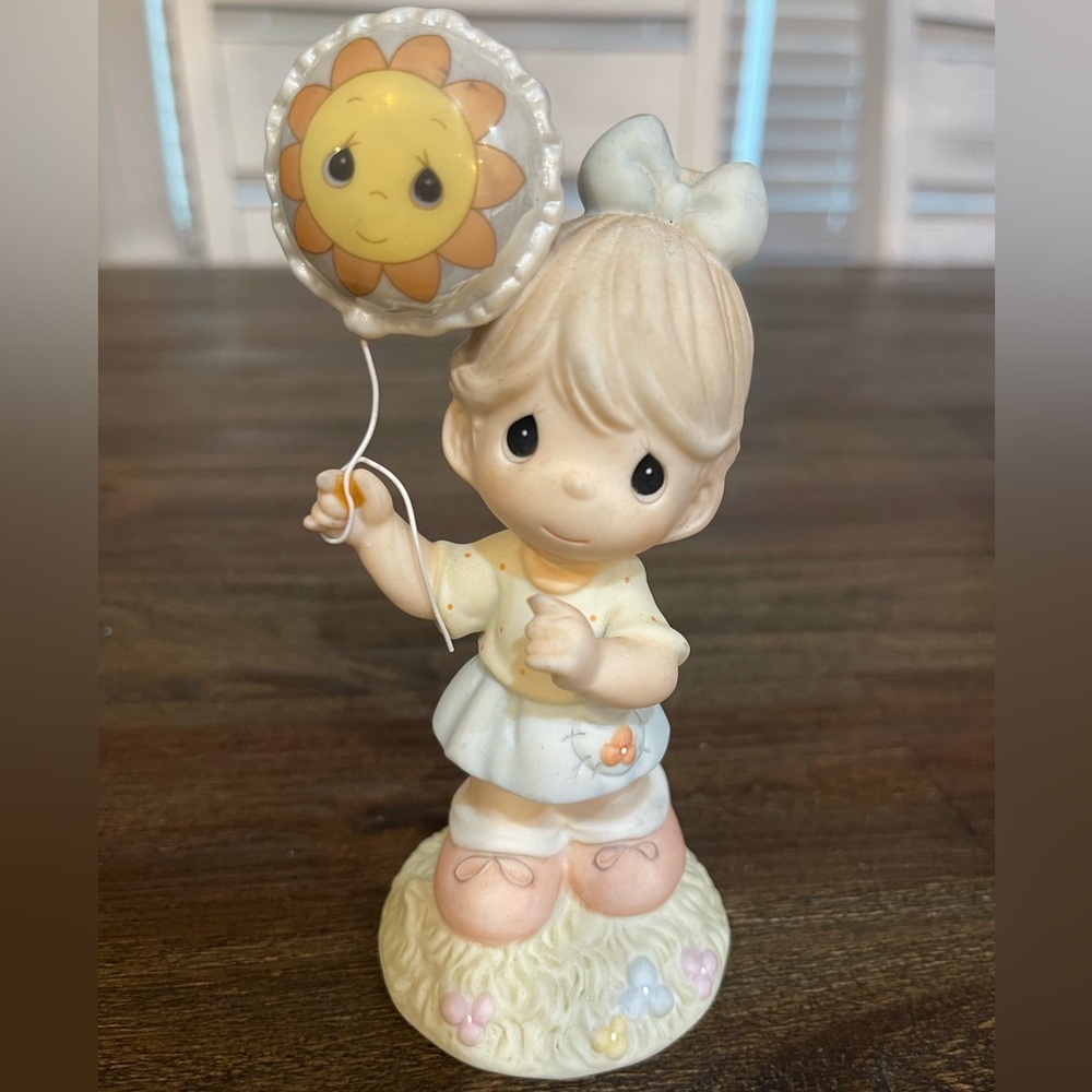 Adorable Child Precious Moments Figurine with Sun Balloon